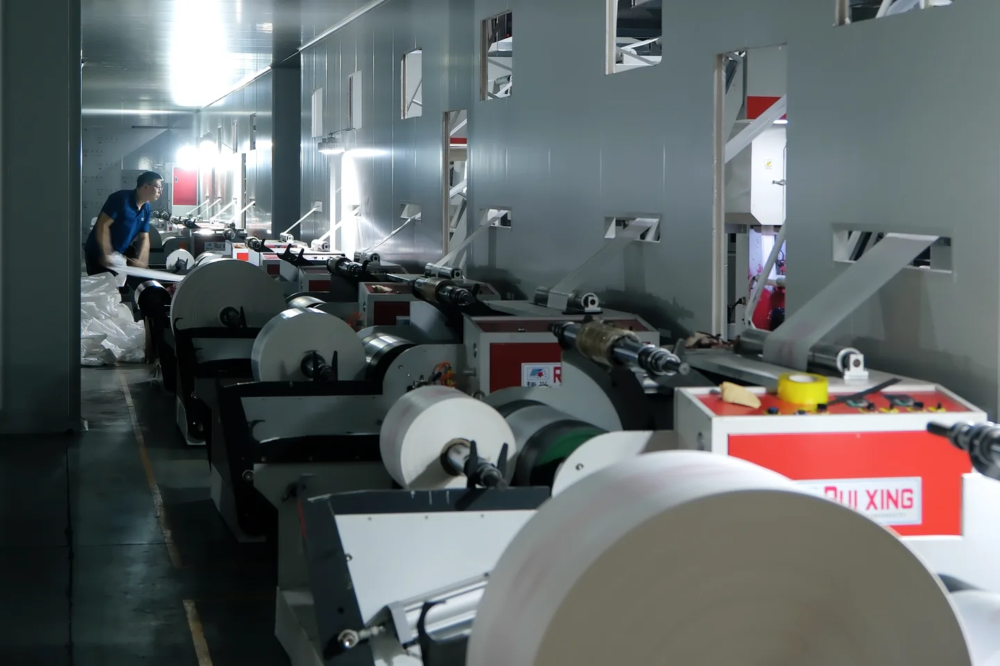 Roll-based plastic bag converting equipment inside Yinling's workshop